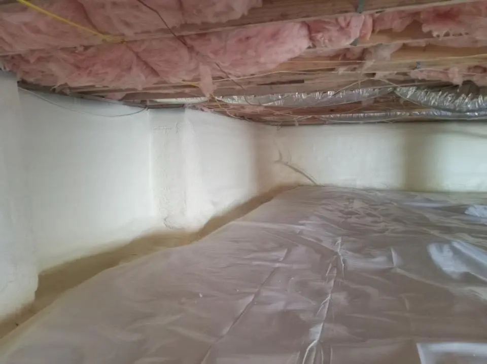 Crawl space encapsulation with closed-cell spray foam for Roof Waterproofing in Newport